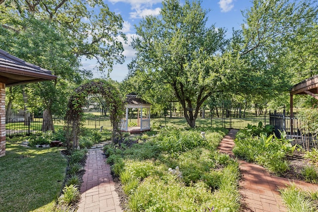 view of yard featuring a gazebo and fence