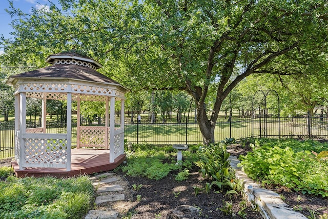 view of yard featuring a gazebo and fence