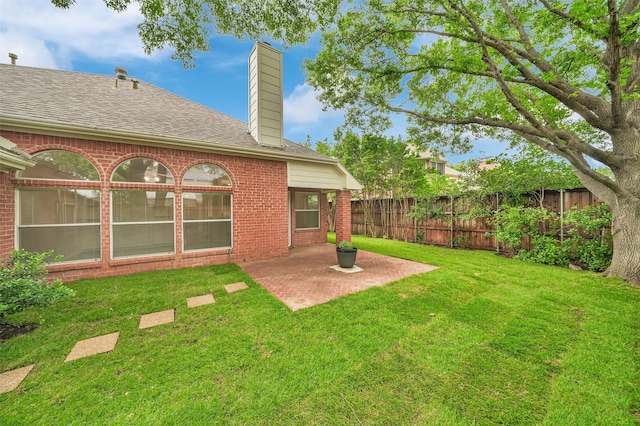 view of yard with a patio area