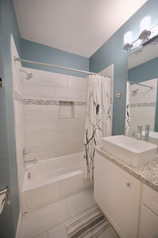 bathroom featuring shower / bath combination with curtain, tile patterned flooring, and vanity