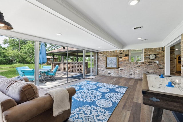 2173 Fairway Acres Dr, Argyle, TX 76226 - living area with brick wall, wood-type flooring, and crown molding