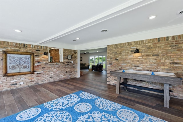 2173 Fairway Acres Dr, Argyle, TX 76226 - living room featuring brick wall, wood finished floors, ornamental molding, a ceiling fan, and beamed ceiling