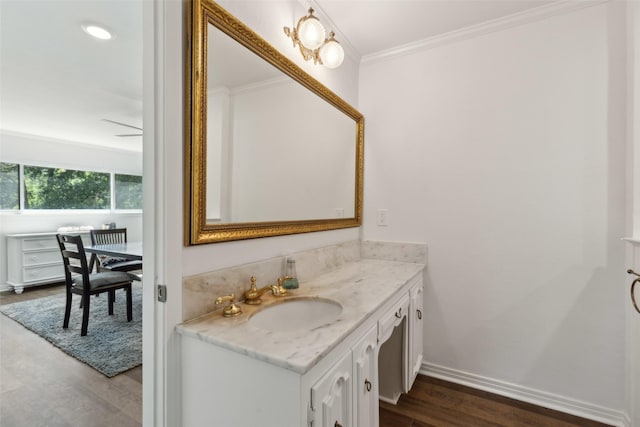2173 Fairway Acres Dr, Argyle, TX 76226 - bathroom with wood finished floors, vanity, ornamental molding, and baseboards