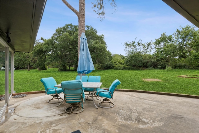 2173 Fairway Acres Dr, Argyle, TX 76226 - view of patio with outdoor dining area and view of wooded area