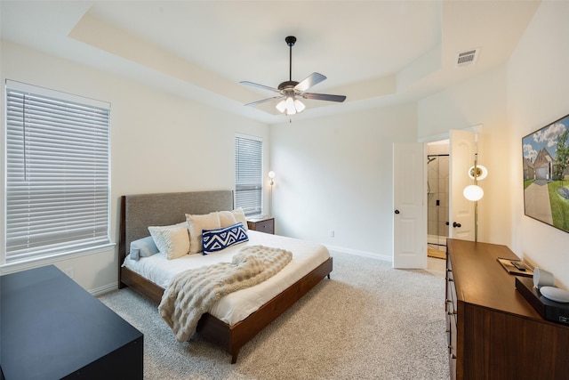 3129 Greymoore Dr, Anna, TX 75409 - bedroom featuring a raised ceiling, light carpet, baseboards, ceiling fan, and an office area