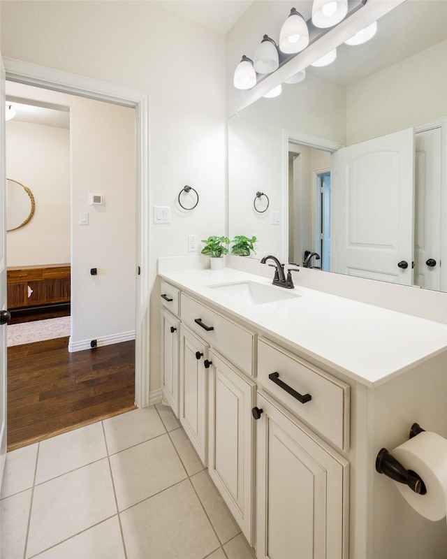 3129 Greymoore Dr, Anna, TX 75409 - bathroom with tile patterned flooring, vanity, and baseboards