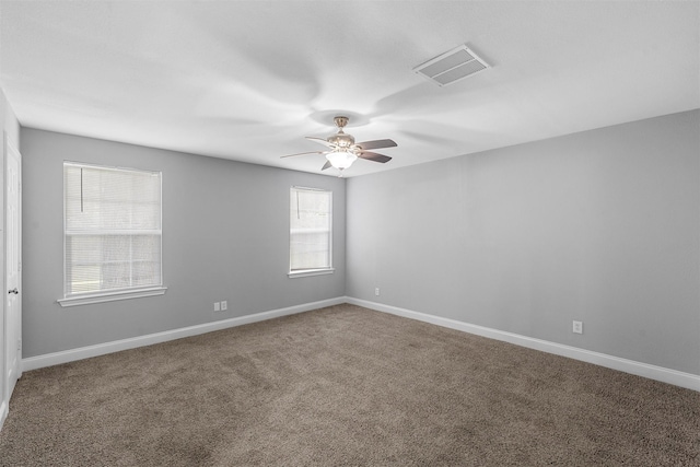 4016 Austin Ave, Waco, TX 76710 - carpeted empty room with a ceiling fan and baseboards
