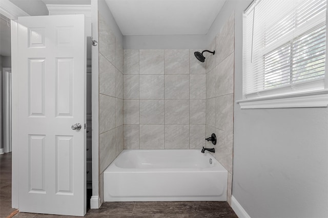 4016 Austin Ave, Waco, TX 76710 - full bath with shower / tub combination, baseboards, and wood finished floors