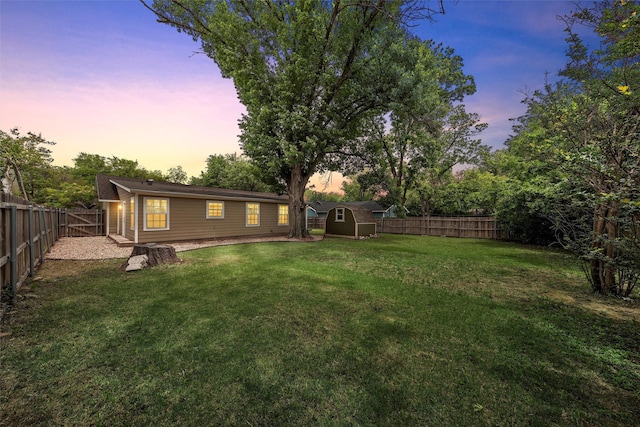 4016 Austin Ave, Waco, TX 76710 - yard at dusk with a shed and an outdoor structure