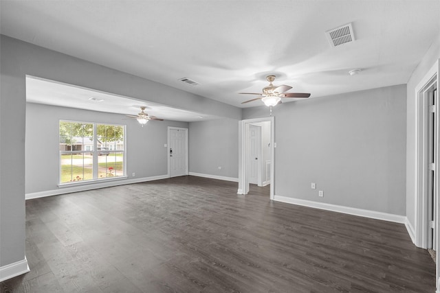4016 Austin Ave, Waco, TX 76710 - unfurnished living room with a ceiling fan, baseboards, and dark wood finished floors
