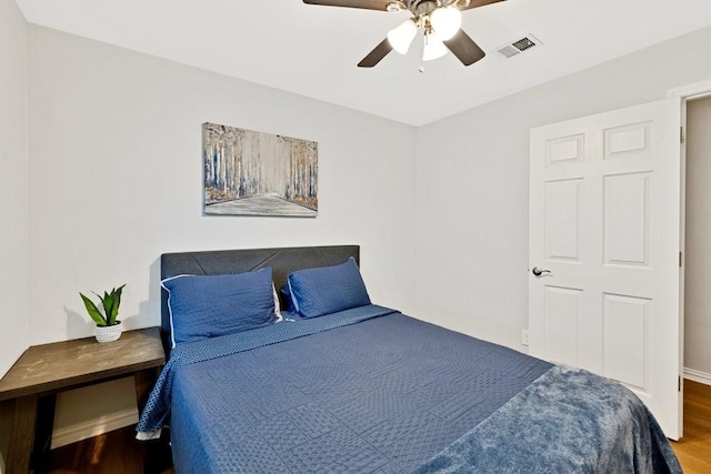 2409 Janice Ln, Fort Worth, TX 76112 - bedroom with wood finished floors and a ceiling fan