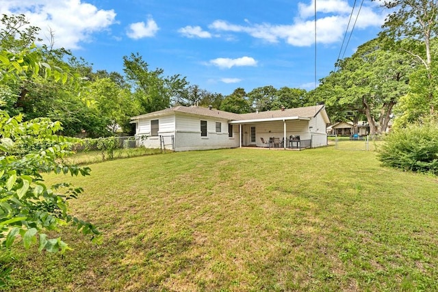 2409 Janice Ln, Fort Worth, TX 76112 - back of property featuring a gate