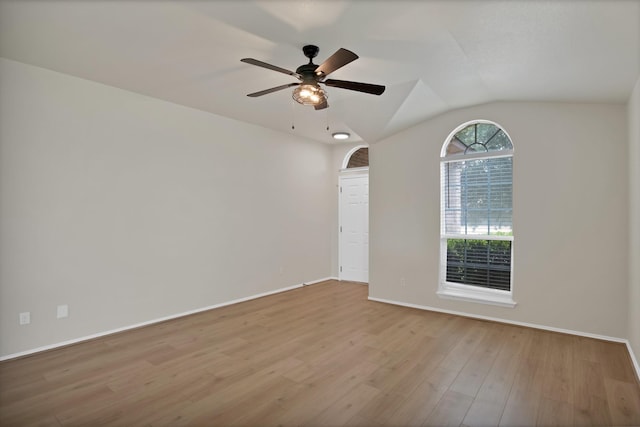 10152 Parker Springs Dr, Waco, TX 76708 - empty room featuring wood finished floors, baseboards, lofted ceiling, and ceiling fan