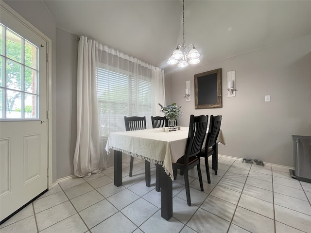 813 Green Acres Ln, Midlothian, TX 76065 - dining room featuring a chandelier, light tile patterned floors, baseboards, and lofted ceiling