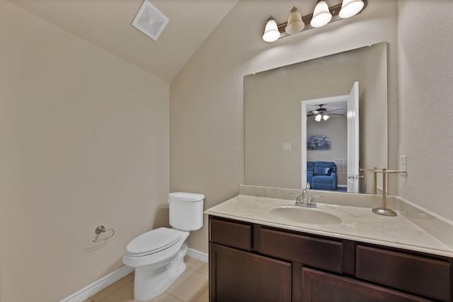 2202 Louis Trl, Weatherford, TX 76087 - bathroom with toilet, tile patterned flooring, vanity, lofted ceiling, and a ceiling fan