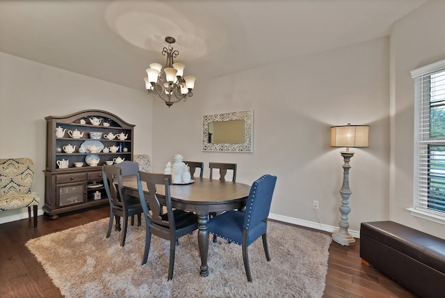 2202 Louis Trl, Weatherford, TX 76087 - dining room with a chandelier, wood finished floors, and baseboards