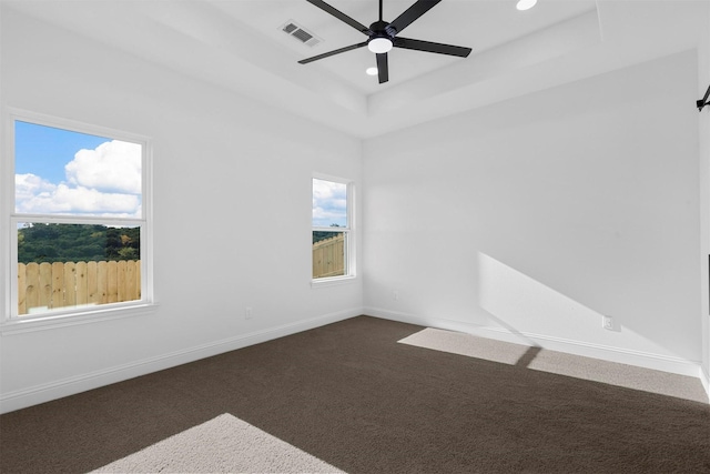 5512 San Jacinto Dr, Granbury, TX 76048 - spare room featuring a tray ceiling, ceiling fan, dark carpet, recessed lighting, and baseboards