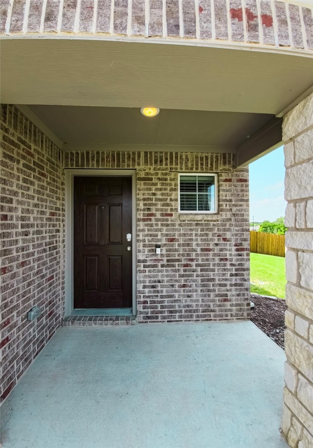 254 Lake Erie Dr, Princeton, TX 75407 - property entrance with brick siding and a patio