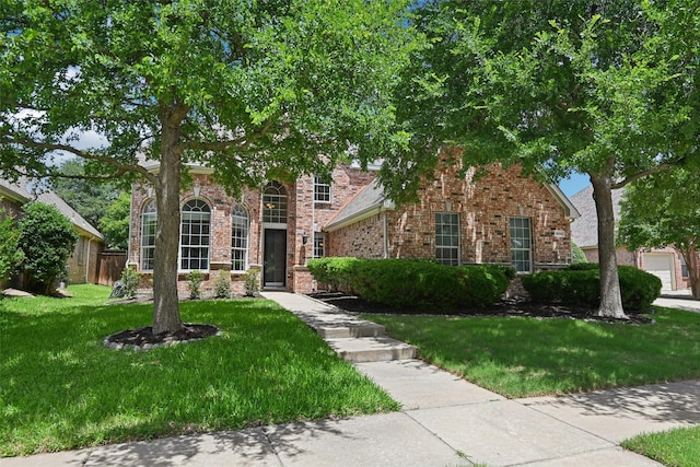 8604 Preston Wood Dr, Mckinney, TX 75072 - view of front of property featuring a front lawn and brick siding