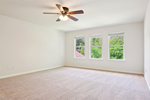 8604 Preston Wood Dr, Mckinney, TX 75072 - empty room featuring plenty of natural light, carpet floors, and ceiling fan