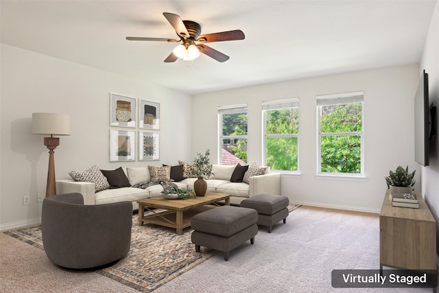 8604 Preston Wood Dr, Mckinney, TX 75072 - living room featuring healthy amount of natural light, a ceiling fan, and baseboards