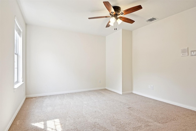 8604 Preston Wood Dr, Mckinney, TX 75072 - empty room with light colored carpet, ceiling fan, and baseboards
