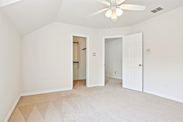 8604 Preston Wood Dr, Mckinney, TX 75072 - unfurnished bedroom with light colored carpet, a spacious closet, lofted ceiling, ceiling fan, and baseboards