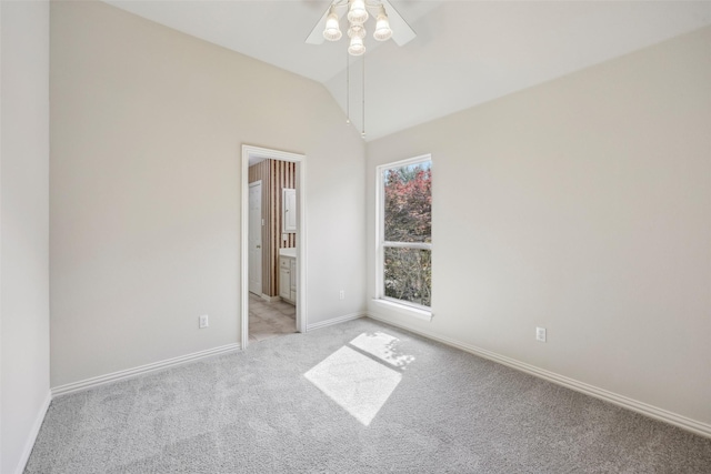 1612 University Dr, Allen, TX 75013 - empty room featuring light colored carpet, a ceiling fan, baseboards, and vaulted ceiling