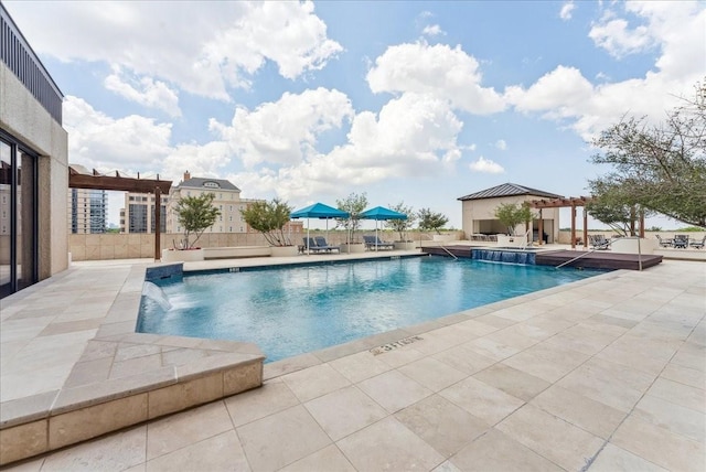 5909 Luther Ln Unit 1002, Dallas, TX 75225 - view of pool featuring a patio, an outbuilding, and fence