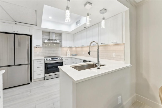 5909 Luther Ln Unit 1002, Dallas, TX 75225 - kitchen with stainless steel appliances, wall chimney exhaust hood, white cabinetry, ornamental molding, and recessed lighting