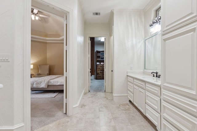 54 Cypress Ct, Trophy Club, TX 76262 - bathroom featuring crown molding, vanity, a ceiling fan, and ensuite bathroom