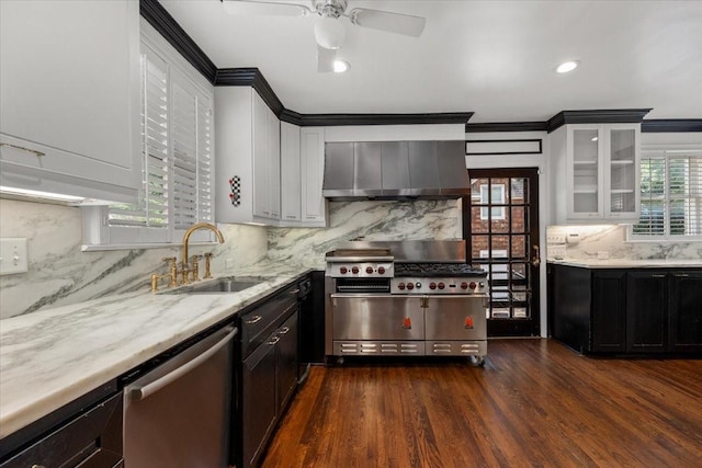 4720 Collinwood Ave, Fort Worth, TX 76107 - kitchen with wall chimney exhaust hood, appliances with stainless steel finishes, a sink, ornamental molding, and decorative backsplash