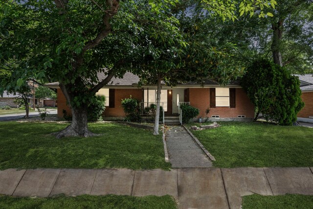 4518 Live Oak Dr, Mesquite, TX 75150 - view of front of property featuring brick siding and a front yard