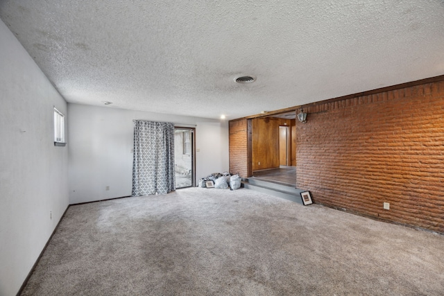 4518 Live Oak Dr, Mesquite, TX 75150 - carpeted empty room with a textured ceiling