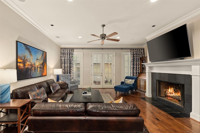 4702 Dexter Ave, Fort Worth, TX 76107 - living area with wood finished floors, recessed lighting, a tiled fireplace, crown molding, and a ceiling fan