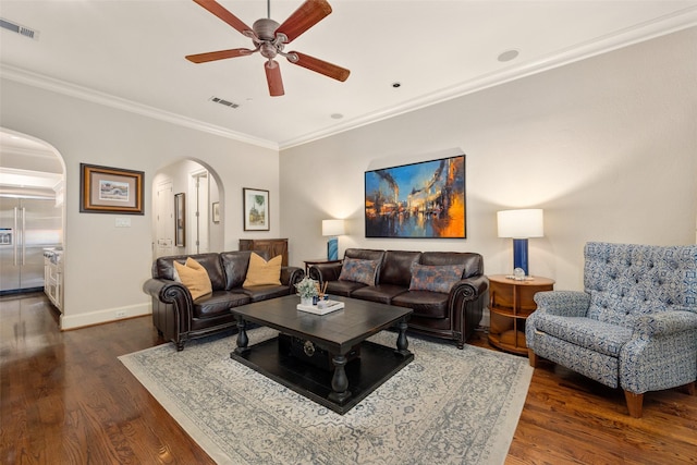 4702 Dexter Ave, Fort Worth, TX 76107 - living area featuring arched walkways, ceiling fan, dark wood-type flooring, ornamental molding, and baseboards