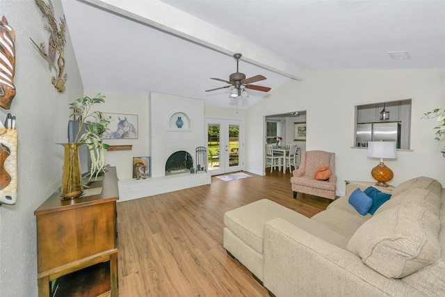 7616 Circle Dr, North Richland Hills, TX 76180 - living area with wood finished floors, french doors, and a ceiling fan
