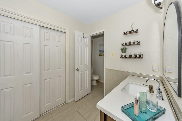 7616 Circle Dr, North Richland Hills, TX 76180 - bathroom featuring toilet and vanity