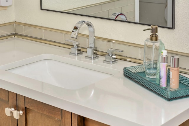 7616 Circle Dr, North Richland Hills, TX 76180 - bathroom view of a textured wall and a sink