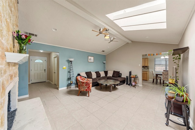 802 Walden Ct, Allen, TX 75002 - living room with a skylight, baseboards, light tile patterned floors, and a fireplace