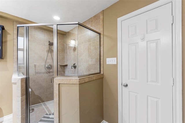 802 Walden Ct, Allen, TX 75002 - bathroom with a stall shower, baseboards, and recessed lighting