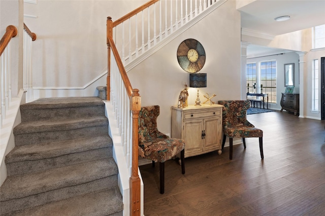4620 Friars Ln, Grand Prairie, TX 75052 - staircase featuring wood finished floors, decorative columns, and ornamental molding