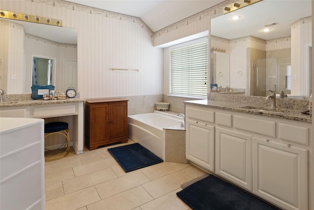4620 Friars Ln, Grand Prairie, TX 75052 - full bath featuring wallpapered walls, a shower stall, a garden tub, tile patterned floors, and two vanities