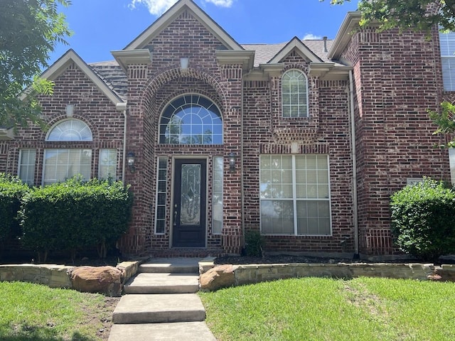 8205 Fountain Springs Dr, Plano, TX 75025 - view of front facade featuring brick siding