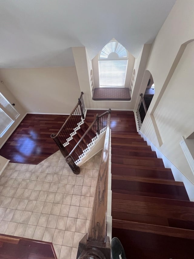 8205 Fountain Springs Dr, Plano, TX 75025 - staircase featuring wood finished floors and baseboards