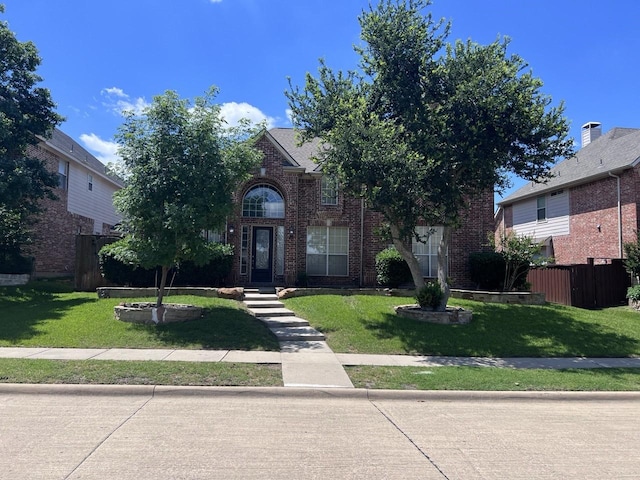 8205 Fountain Springs Dr, Plano, TX 75025 - obstructed view of property with brick siding