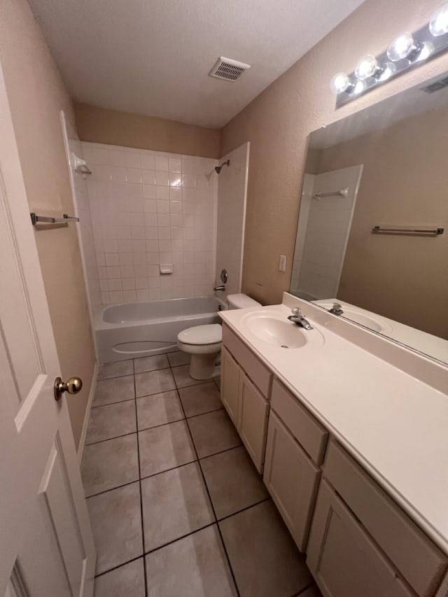 8205 Fountain Springs Dr, Plano, TX 75025 - full bathroom featuring toilet, tile patterned floors, washtub / shower combination, and vanity