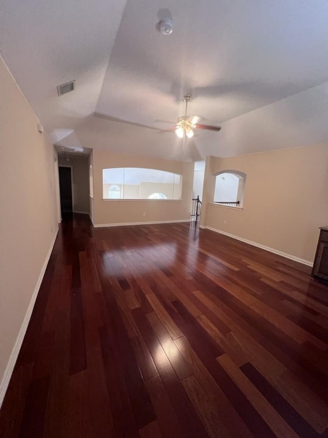 8205 Fountain Springs Dr, Plano, TX 75025 - unfurnished living room featuring wood finished floors, baseboards, and a ceiling fan