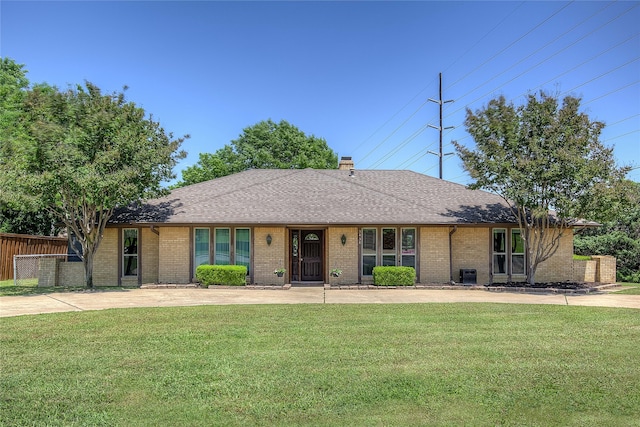 3438 Morning Star Ln, Garland, TX 75043 - view of front of house with brick siding, a chimney, and a shingled roof