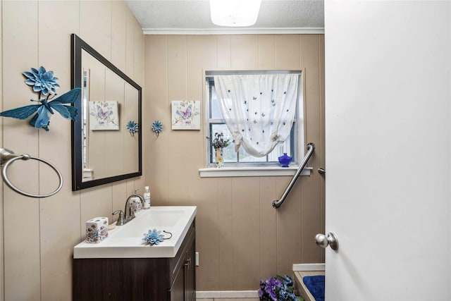 7223 Fm 2494, Athens, TX 75751 - bathroom featuring vanity, a decorative wall, and a textured ceiling